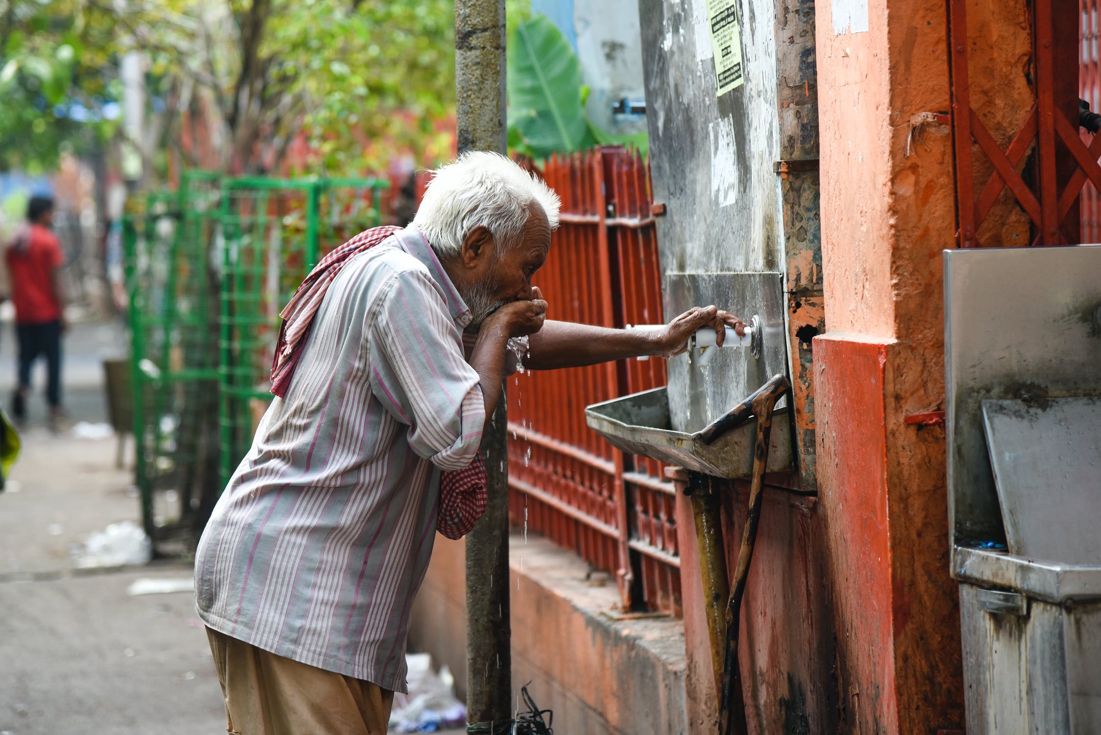 man drinking water